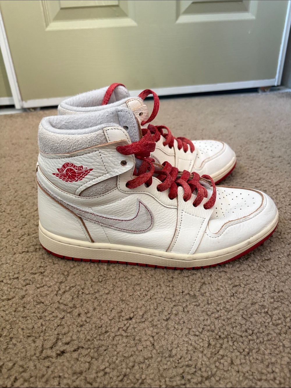 Jordan Women’s White and Red High-Top Sneakers with Red Laces